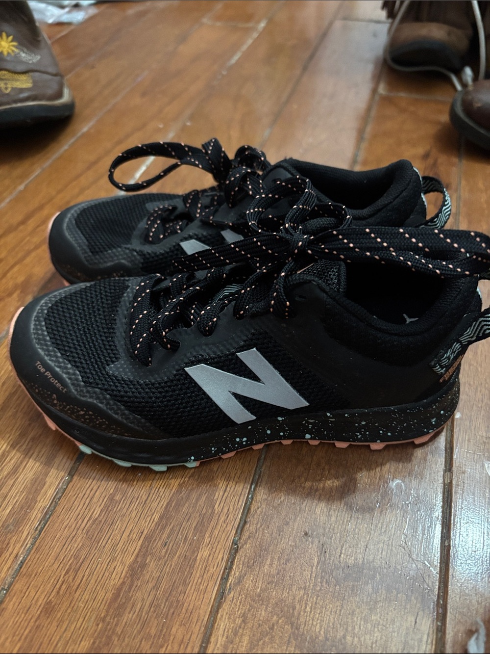 New Balance Kids Black and Pink Accent Trail Sneakers